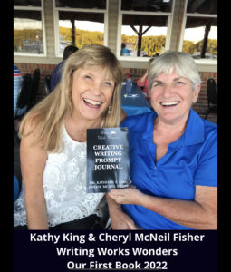 Photo of Cheryl McNeil Fisher and Kathy King holding the first book published by Writing Works Wonders. Yes it is the Writing Works Wonders creative writing prompts book published in 2022.